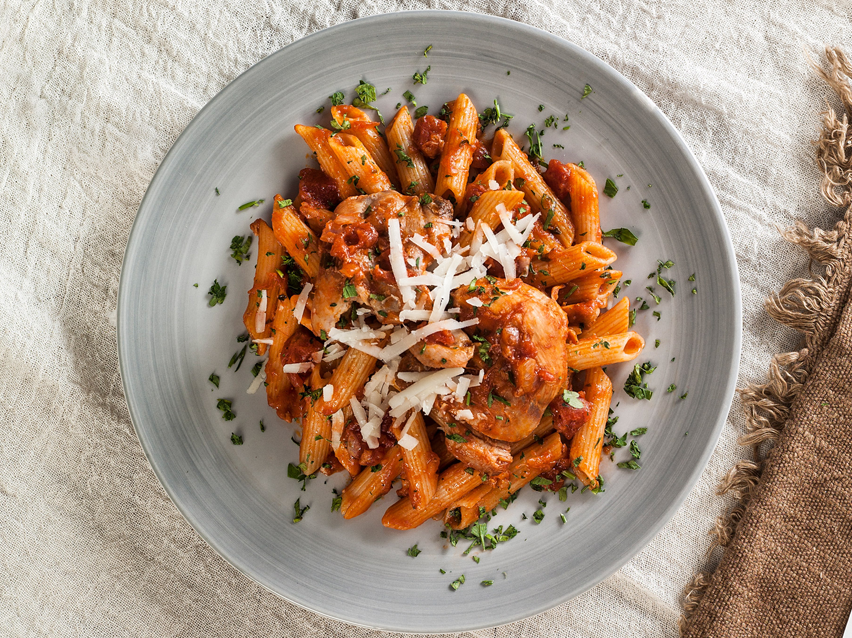 Penne with braised chicken thigh fillet