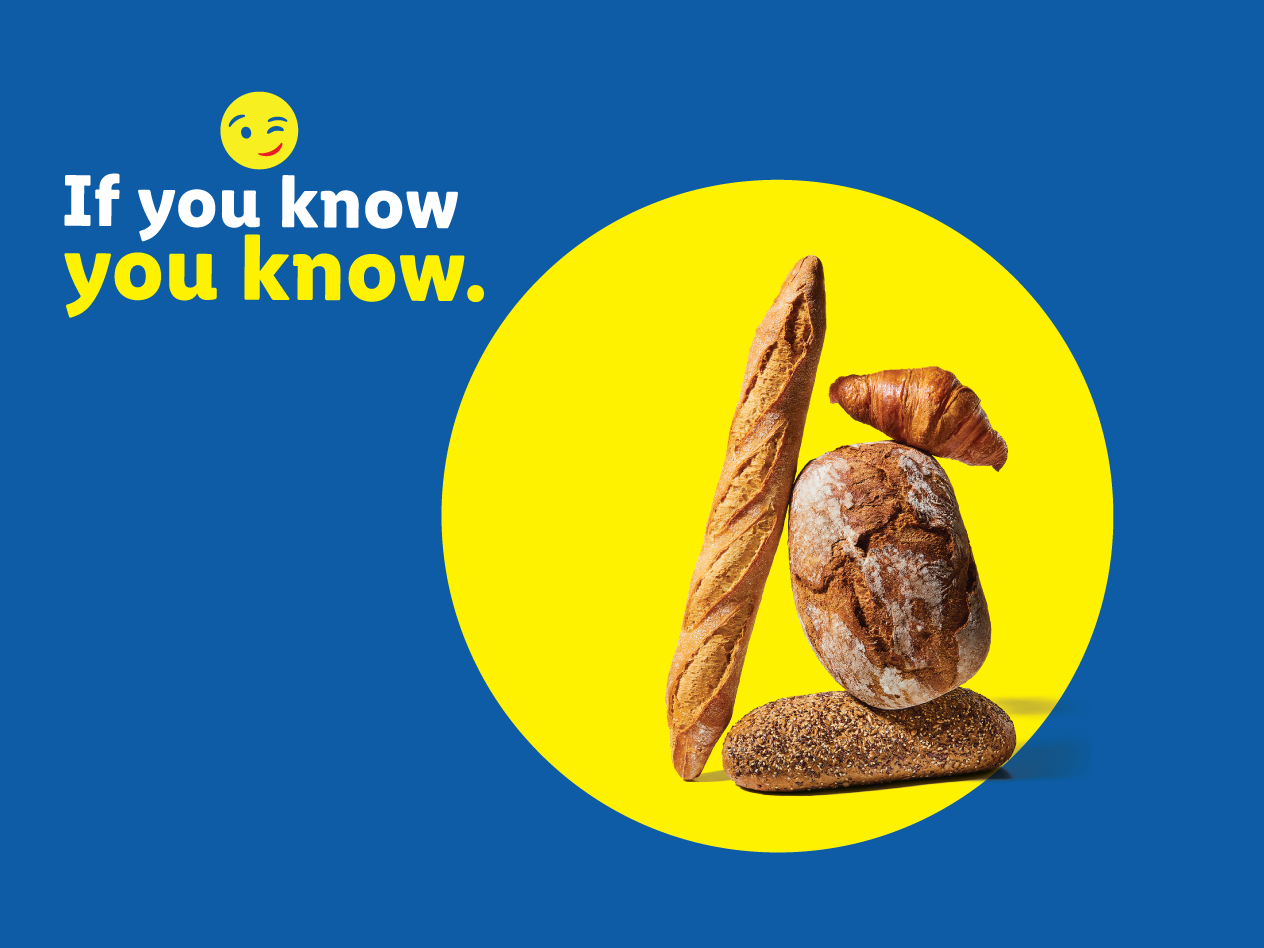 Various baked goods, including baguettes, bread, and a croissant, on a yellow circle with text: If you know you know.