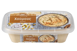 Ντιπ χούμους σε διαφανές πλαστικό δοχείο με ρεβίθια και κρεμμύδια
