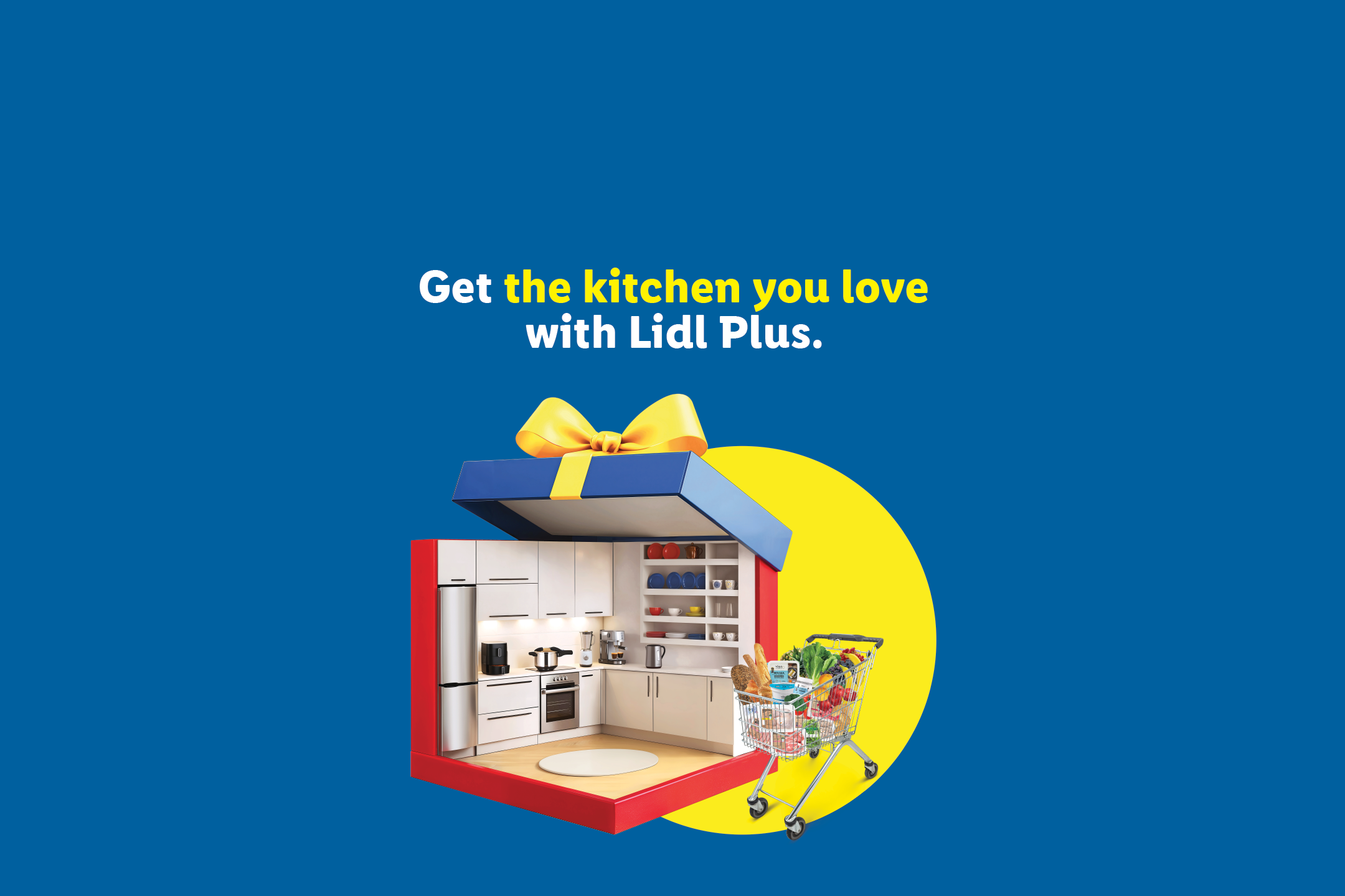 A gift box opens to reveal a modern kitchen and a shopping cart full of groceries. Text: Get the kitchen you love with Lidl Plus.