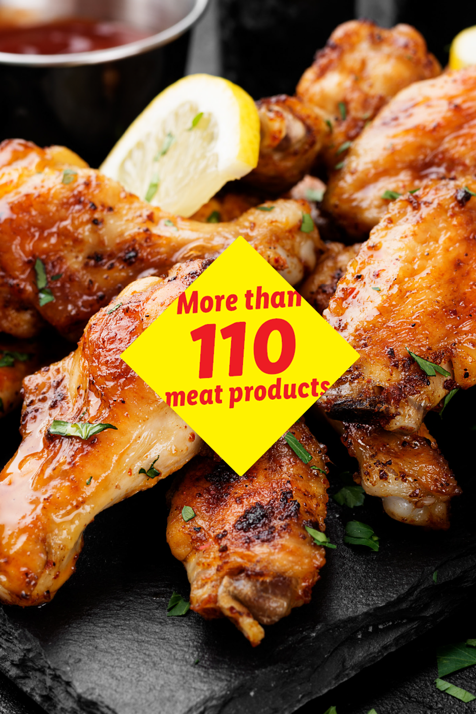 Grilled chicken wings with lemon and sauces, advertising 'More than 110 meat products'.