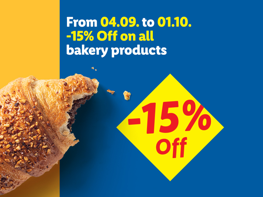 A croissant with nuts and chocolate filling, advertising 15% off all bakery products.