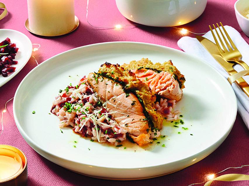 Baked salmon with beetroot risotto.