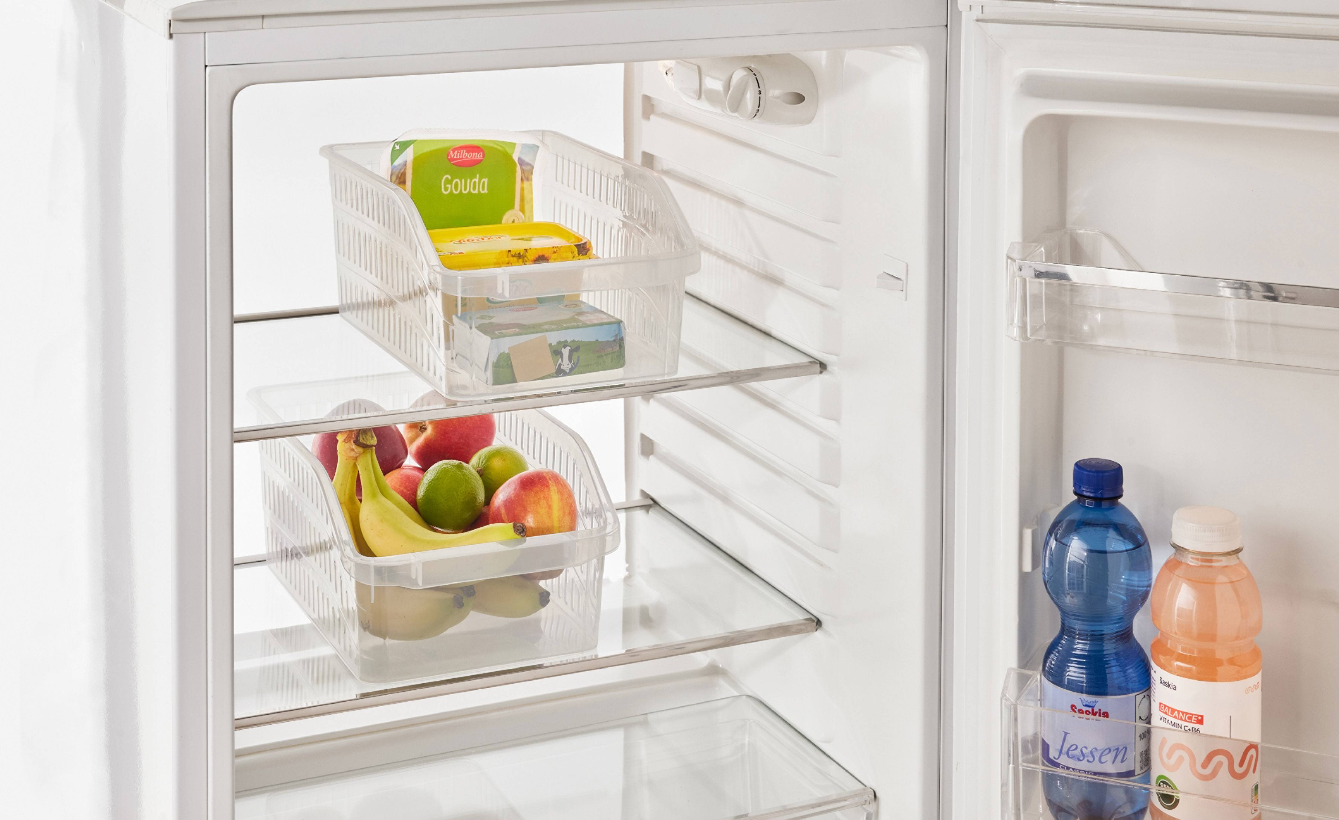 Open refrigerator with clear containers for cheese, butter, fruit, and beverages.