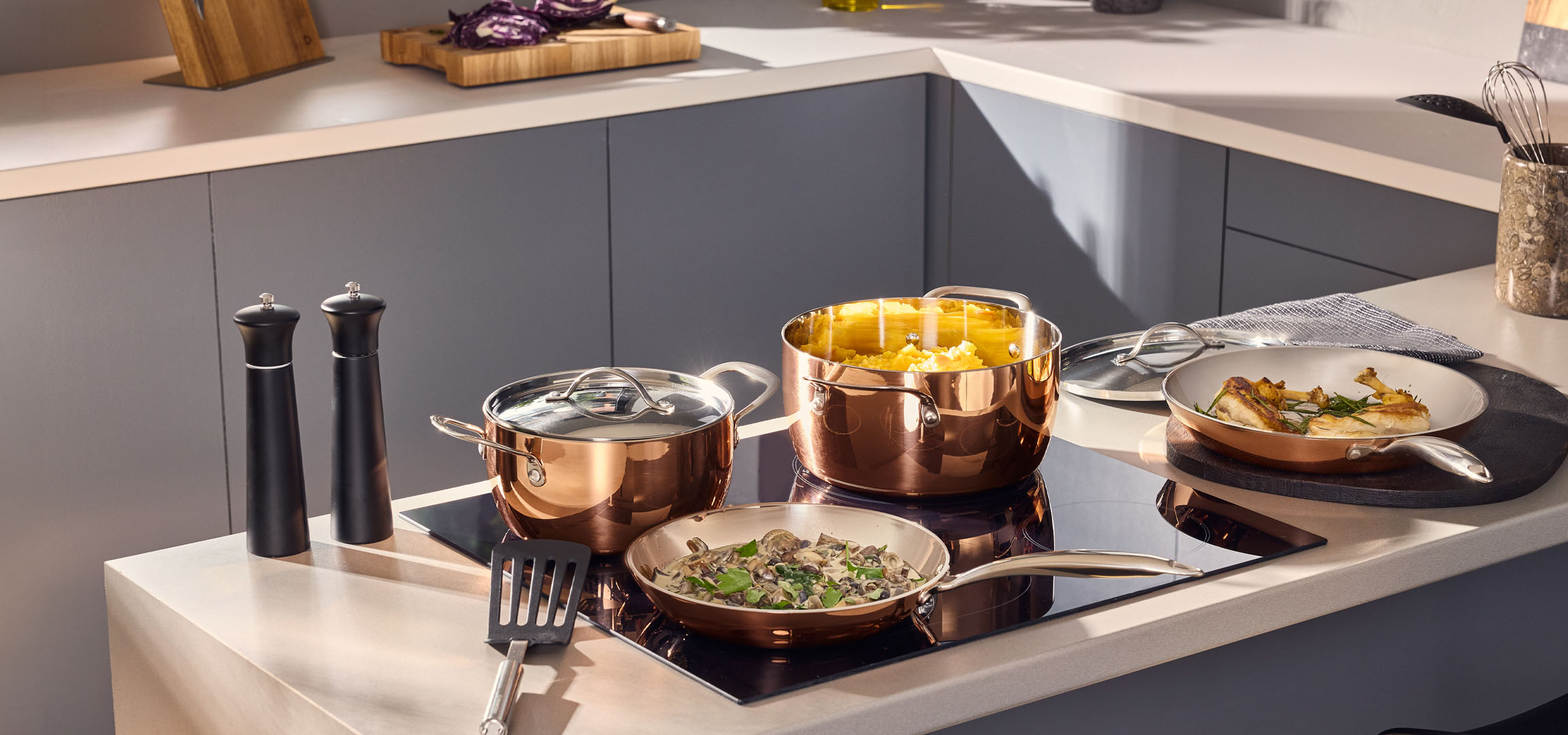 AI generated image: Copper-colored pots and pans with food on an induction hob.