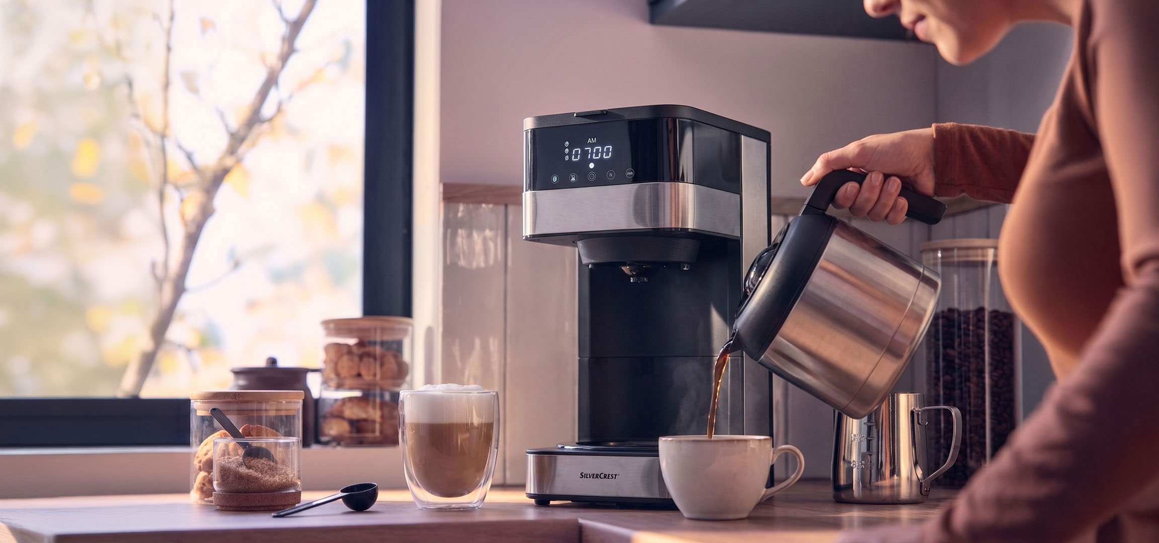 AI generated image: Coffee machine pouring coffee into a cup, with a bright window in the background.