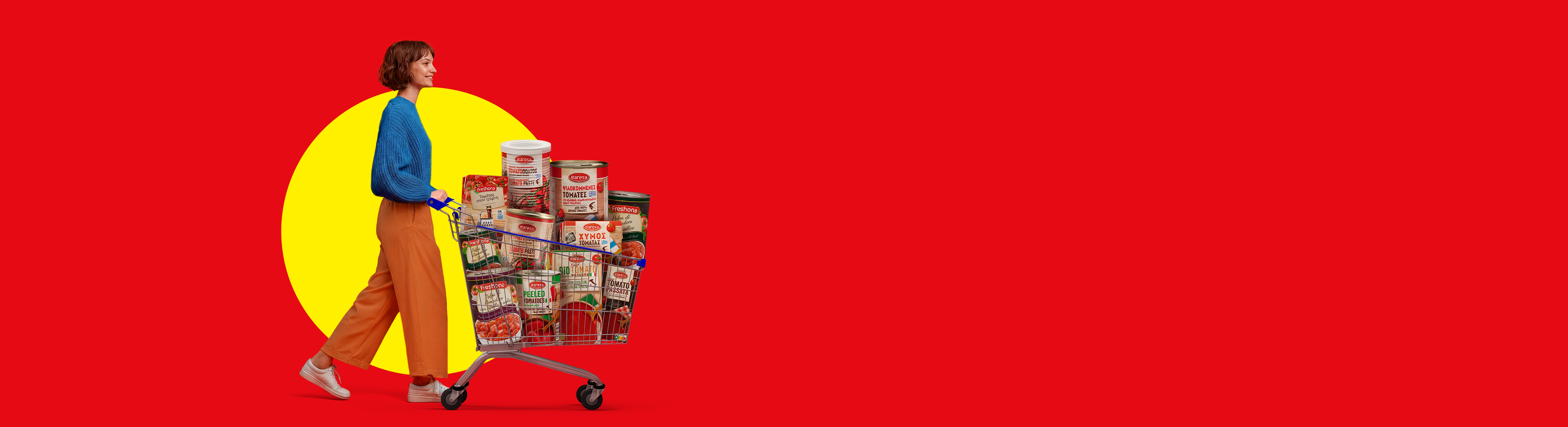 Woman pushing a shopping cart filled with various tomato products against a red and yellow background.