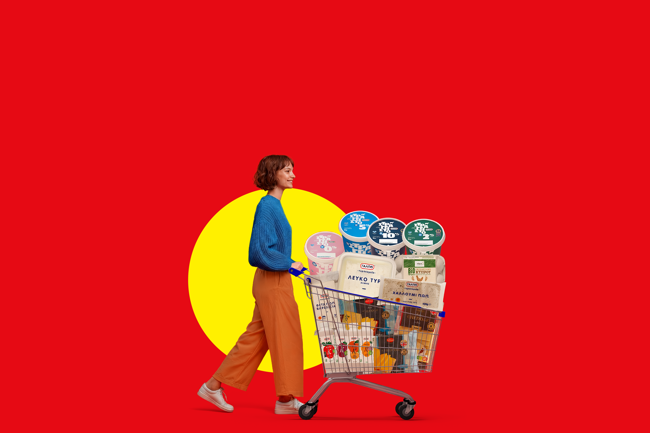 Woman pushing a shopping cart filled with dairy products and cheeses, against a red and yellow background.
