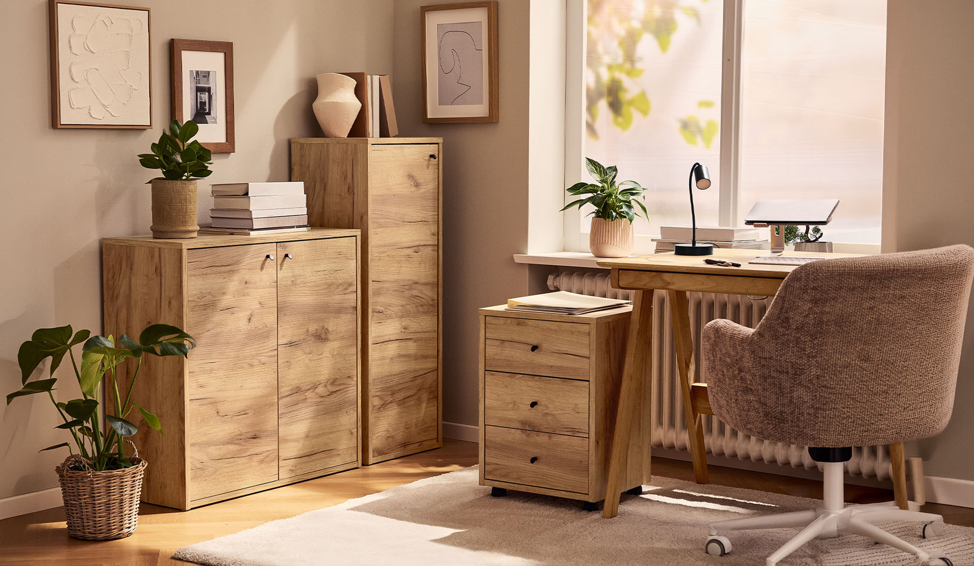 Wooden cabinets and desk with an office chair in a home office.