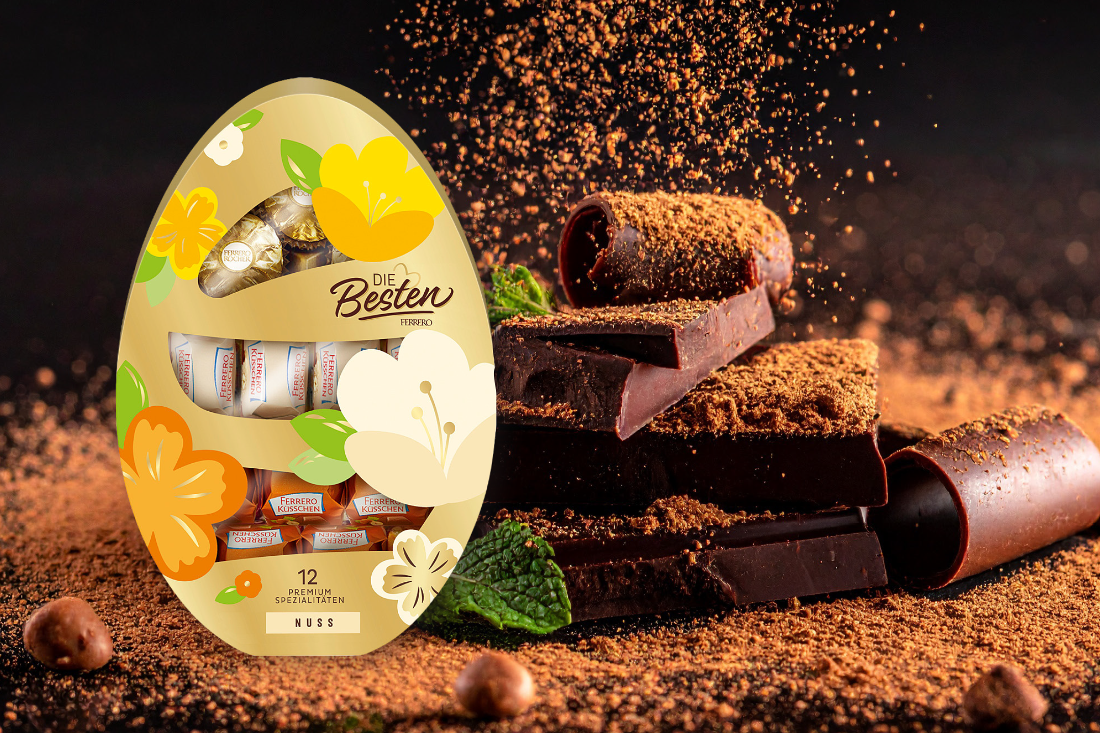 Easter egg box with assorted chocolates, surrounded by chocolate pieces and cocoa powder.