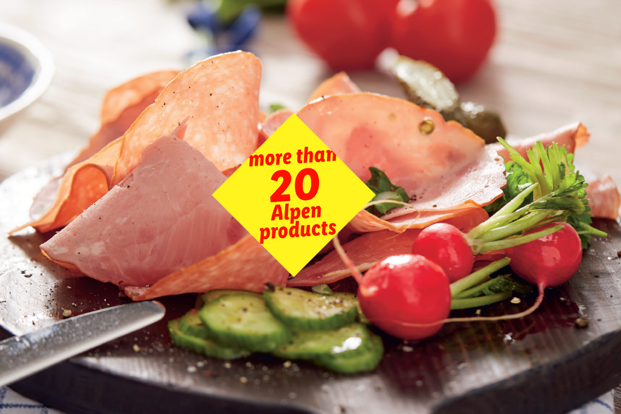 A platter of sliced deli meats, radishes, and cucumbers, with a yellow diamond overlay stating 'more than 20 Alpen products'.