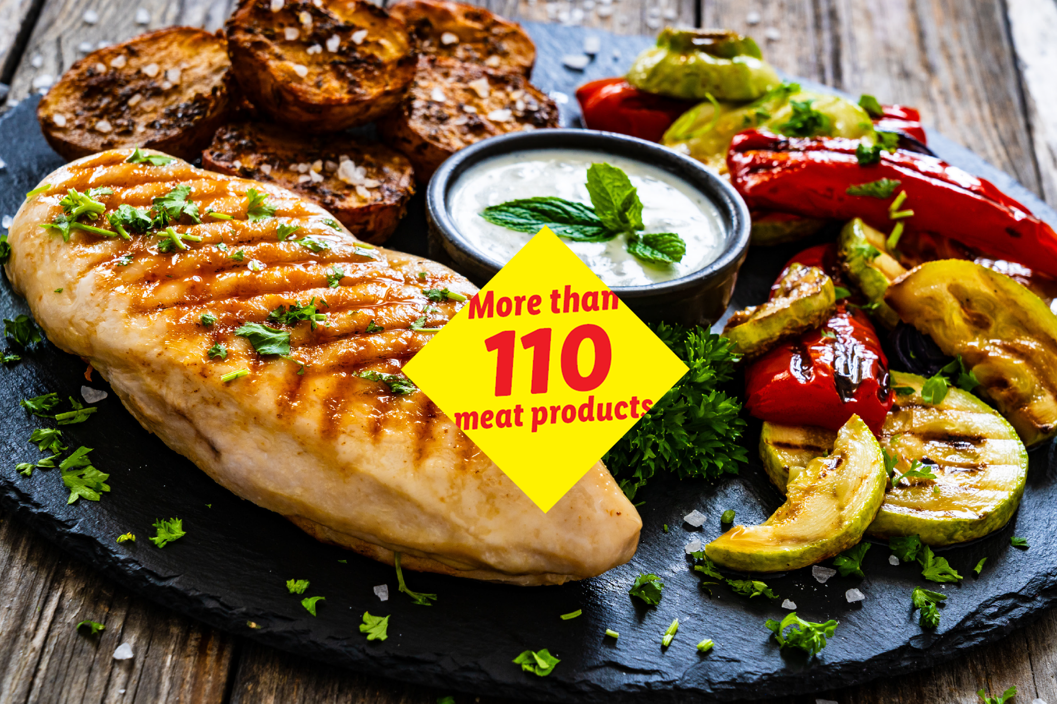 Grilled chicken breast with roasted vegetables, dip, and toast. Text: 'More than 110 meat products'