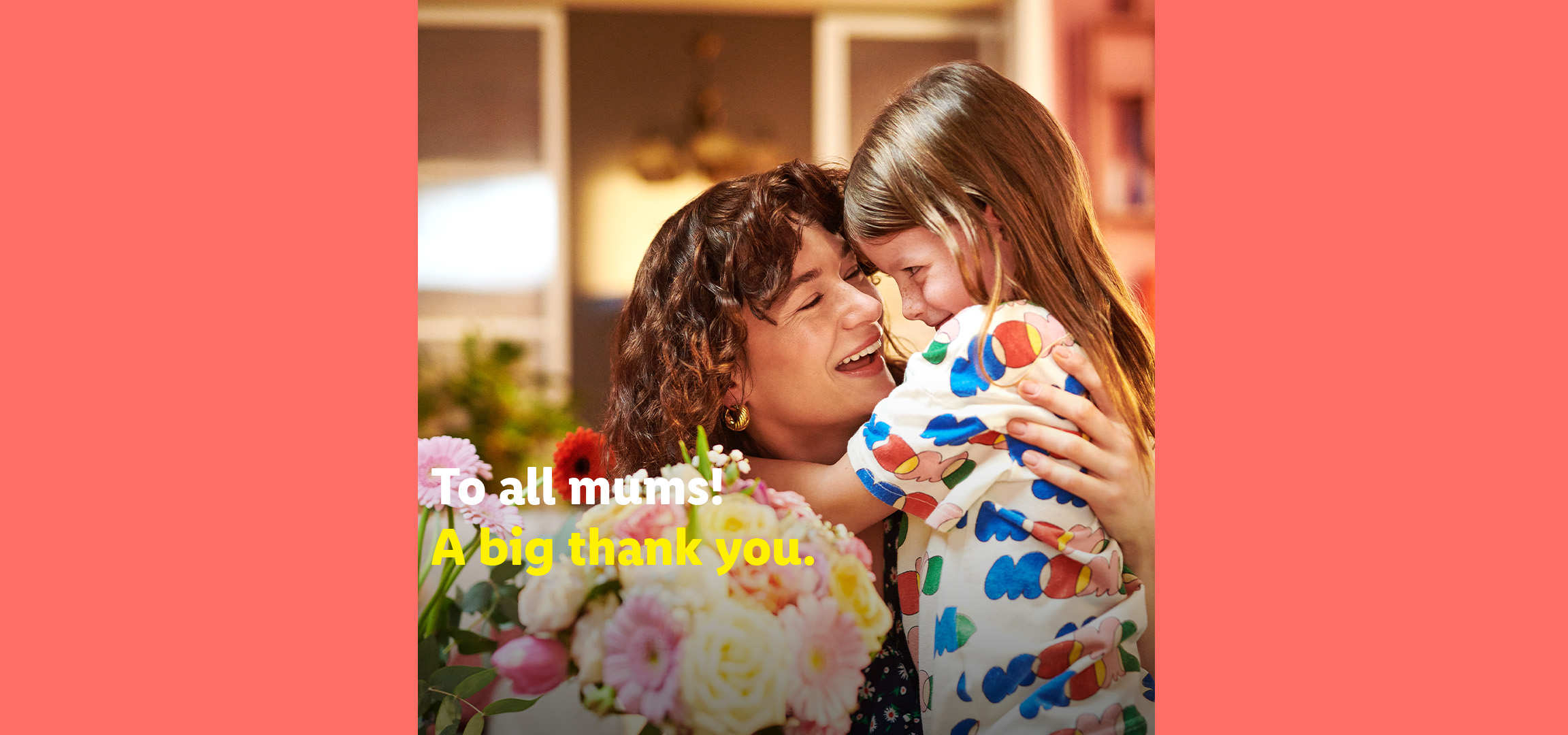 A woman with glasses hugging a child, with text 'To all mums! A big thank you.'